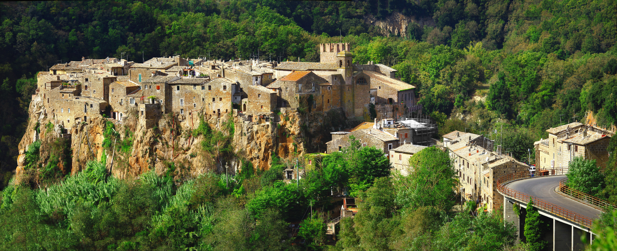 The medieval village of Calcata, built on a tuff cliff, offers breathtaking views and a timeless atmosphere.